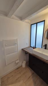 Appartements Maison plein centre ville a 100 m de la plage : photos des chambres