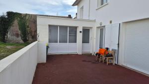 Appartements Maison plein centre ville a 100 m de la plage : photos des chambres