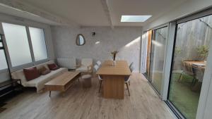 Appartements Maison plein centre ville a 100 m de la plage : photos des chambres