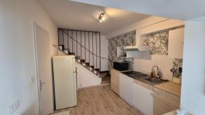 Appartements Maison plein centre ville a 100 m de la plage : photos des chambres