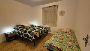 Appartements Maison plein centre ville a 100 m de la plage : photos des chambres