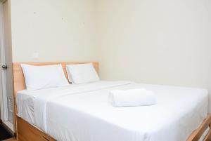 Relaxing Studio at Springlake Sumarecon Bekasi Apartment By Travelio