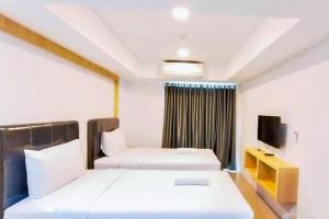 Comfort Studio at De Prima Apartment By Travelio