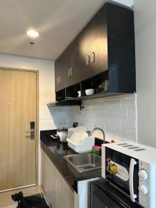 Cozy 2BR Unit in VINE Residences, Quezon City