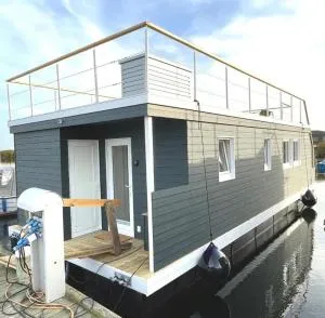 Hausboot Bruntje mit Dachterrasse in Schleswig - Шлезвиг