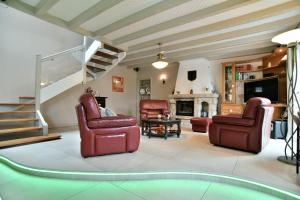 Maisons de vacances Chez Marie-Celine - Maison avec jacuzzi a 20 min du Val Andre : photos des chambres