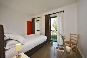 Appart'hotels Les Jardins du Porche : photos des chambres