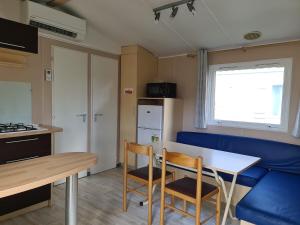Appartements Mobil home climatise, Wi-Fi, 30 minutes du Puy duFou, proche de la piscine : photos des chambres