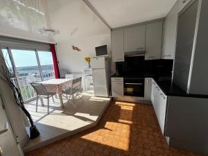 Appartements Studio 5/6 Personnes avec Piscine et WIFI - FR-1-784-40 : photos des chambres