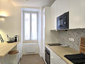 Appartements Le Sarrail - Appartement 2 a 4 personnes - 1 chambre double separee - 5 min a pied de la gare et centre ville : photos des chambres
