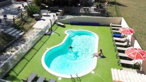 Campings Chalet 2 etoiles - Piscine - ccbaeia : photos des chambres