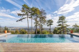 Maisons de vacances Ermitage - Magnificent Villa with Panoramic View Saint-Cyr-au-Mont-d-Or : photos des chambres