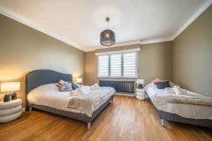 Maisons de vacances La Maison Royale - Terrasse et Jardin : photos des chambres