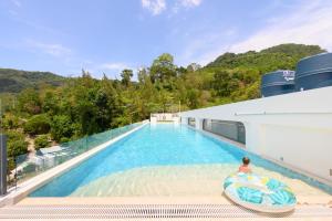NEW RESIDENCES at Fantasea Condo Kamala by Phuket Sabay Rent - Top Amenities - Pool, Gym, Coworking & Beach Proximity