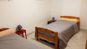 Maisons de vacances La Petite Maison Sous les Pins : photos des chambres