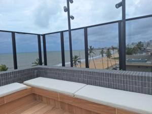 Requinte e conforto a beira-mar