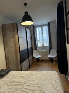 Appartements Logement au pied de la gare : photos des chambres