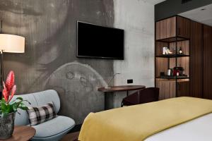 Superior Double Room with View and Balcony room in NH Collection Amsterdam Flower Market