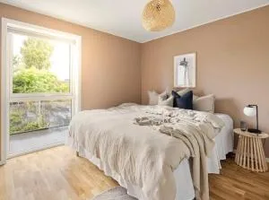 Modern apartment near Fana Stadium with parking - Søfteland