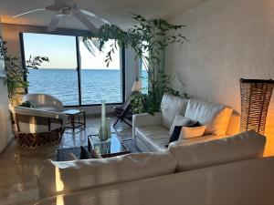 Cancun condo en la playa de Puerto Juarez