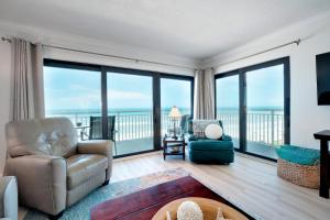 Large oceanfront balcony with pool & beach access located on the no-drive beach!