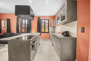 Maisons de vacances Maison d-architecte avec Jacuzzi, Quartier Premontres : photos des chambres
