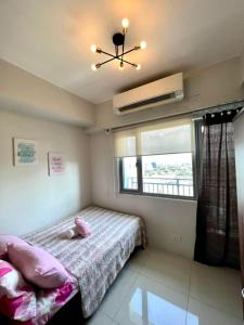 GRASS RESIDENCES 1BR with BALCONY