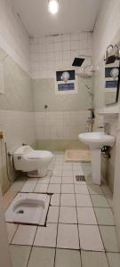 شقة أرضية عائلية مكونة من 3 غرف نوم وصالة ومطبخ 7