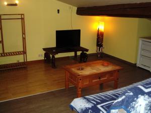 Appartements hotellerie LE GRILLADOU : photos des chambres