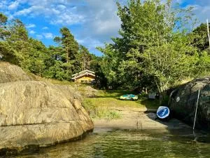 Seaside cabin with boat and beach in Kragerø - Kragero
