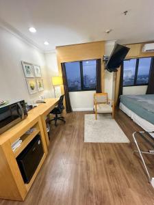 Flat com conforto e requinte em frente Aeroporto - H1001