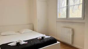 Appartements Le Distingue Central - Gare : photos des chambres