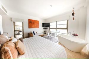 La Amada Residences Private Beach Getaway with Pools & Gym