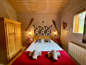 Chalets Le Murmure du Ruisseau, 4 etoiles avec sauna et terrasse : photos des chambres