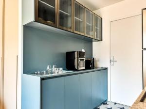 Studio Conforto e estilo Loft em Pinheiros