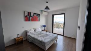 Maisons de vacances Villa with sea and mountain views : photos des chambres