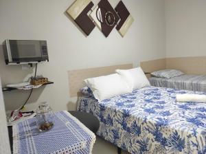 Suíte privativa no Bairro Custódio Pereira próximo ao Campus Umuarama UFU