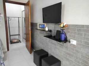 Suíte privativa no Bairro Custódio Pereira próximo ao Campus Umuarama UFU