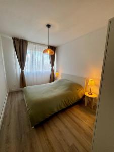 Appartements Cozy 2 bedrooms : photos des chambres