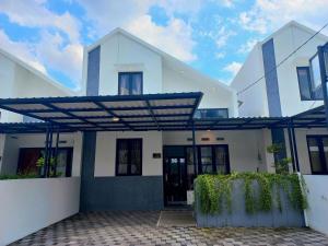 Homestay Jogja Simply Homy Unit Jambon - 3hvězdičkové hotely ve městě Jetis