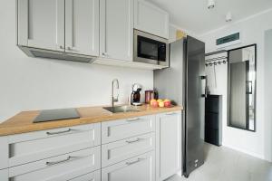 Emilii Plater 55 Center 3 bedrooms Living room balcony