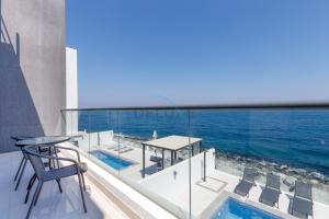 Sea-Facing 4BR Villa with Two Assistant Room, Heated Pool and Barbecue Space, Al Dana Island, Fujairah by Deluxe Holiday Homes