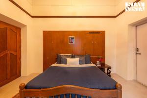 StayVista at Serenity of Sunny Side with TV, Lawn, Lake View