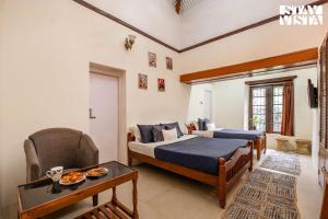 StayVista at Serenity of Sunny Side with TV, Lawn, Lake View