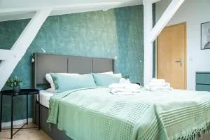 FerienWOHNUNG Dachgeschoss - Citynah - Sülzetal