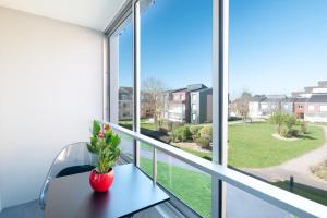 Appartements L’Ecume de Courseulles - A 2min de la plage : photos des chambres