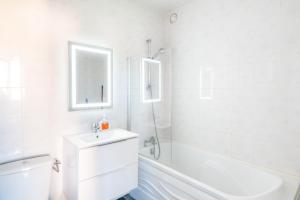 Appartements L’Ecume de Courseulles - A 2min de la plage : photos des chambres