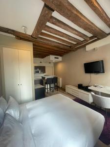 Appartements Habitat Parisien - Marais Sicile : photos des chambres