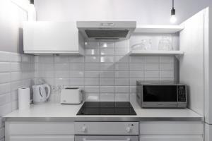 Grzybowska 13th Floor Stylish Apartment by BookingHost