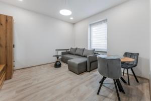 Centrinis butas šalia senvagės